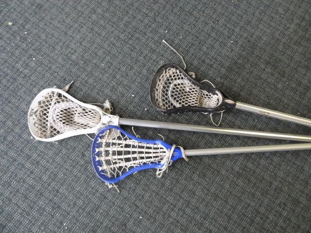 lot 124 image: 3-Lacrosse Sticks 2 boys (1defende...
