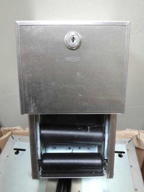 lot 34 image: 8-Bobrick Wall Mountable Toilet Pap...