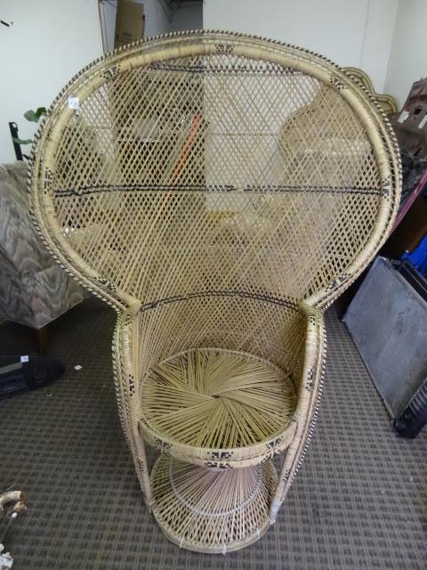 lot 131 image: Wicker Chair...