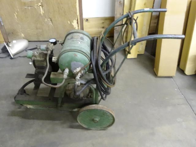lot 81 image: Vintage Air Compressor 110V on Cart...