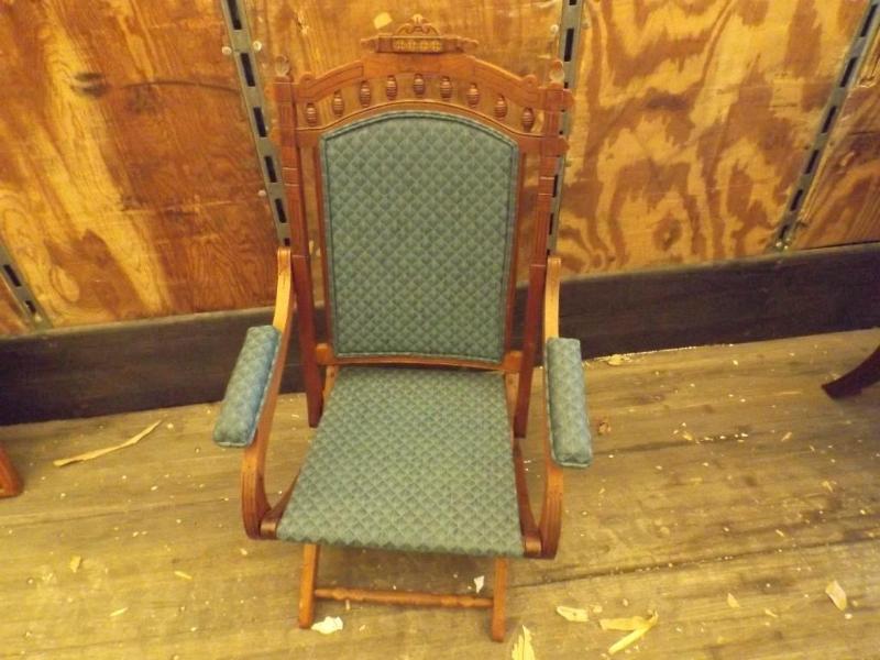 Green and blue folding chair.&nbsp...