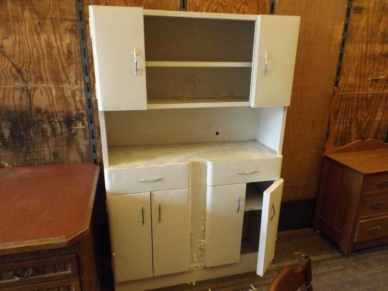 White sheet metal cabinet solid but...