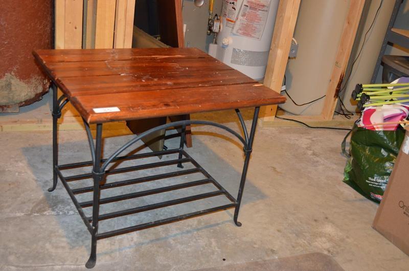 lot 35 image: Beautiful wood and iron table. Lowe...
