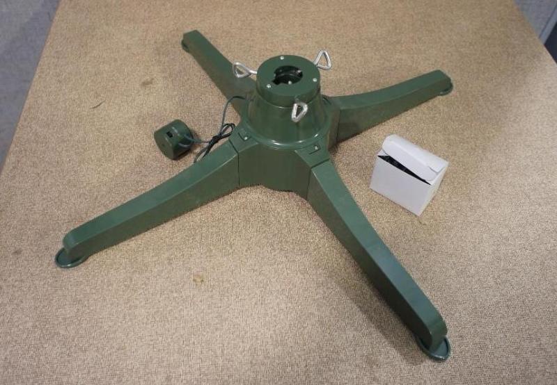 lot 117 image: Rotating Christmas Tree Stand. Plea...
