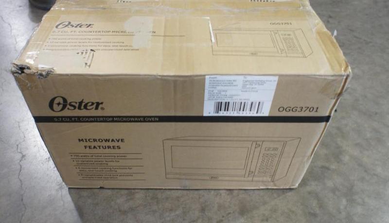 lot 14 image: Oster Microwave Model #0GG3701. Ple...