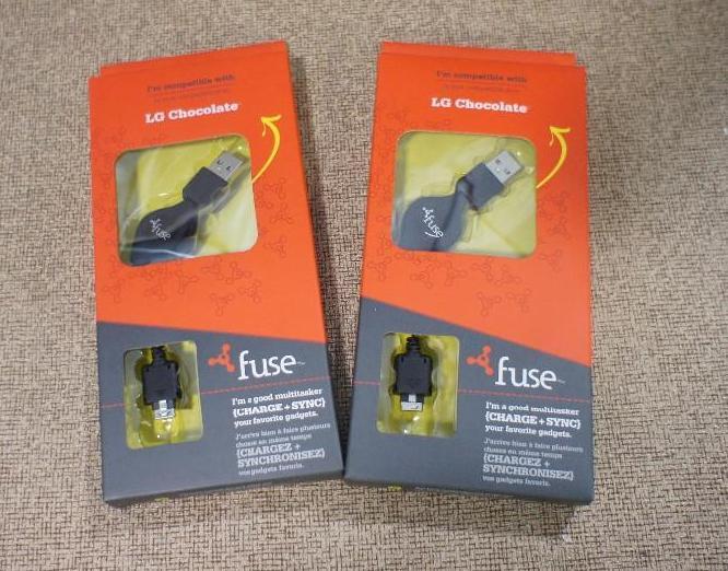 lot 144 image: New in box (2) LG Chocolate USB  C...