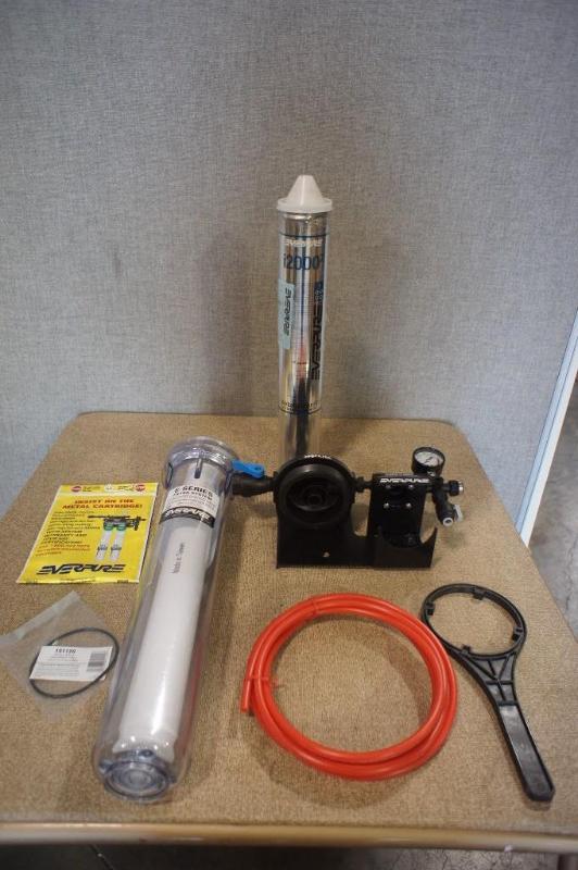 lot 28 image: E-Series Water Filter System. Pleas...