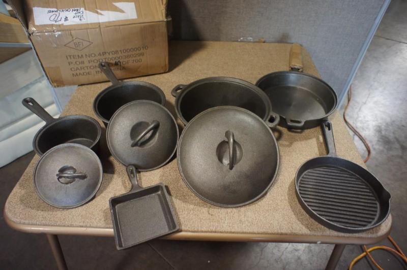 lot 71 image: Cast Iron Pots & Pan 9 pc set. ...