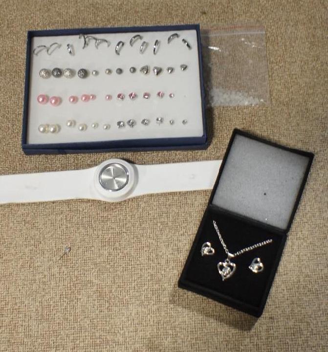 lot 80 image: Rubber Snap White Watch, Earrings S...