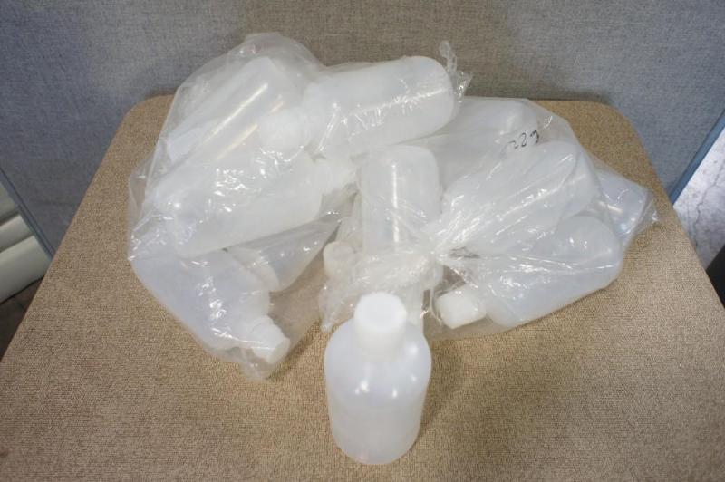 lot 86 image: Lot of (14) 1 liter clear plastic w...