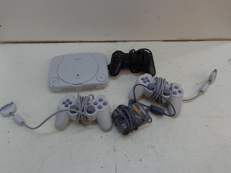 lot 123 image: Sony PSone w3 Controllers Power Su...