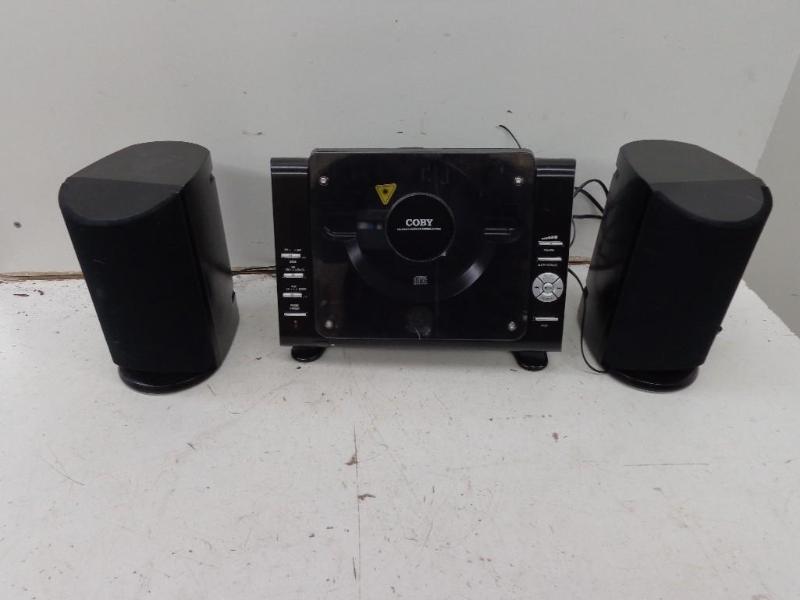 lot 14 image: Coby CX-CD377 Micro CD Stereo Syste...
