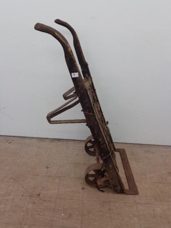 lot 7 image: Antique Steel Wheeled Dolly 5 Tall...
