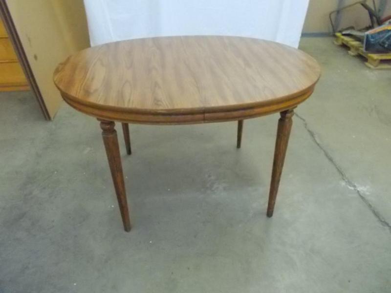 lot 17 image: Oval table with oak formica top. Le...