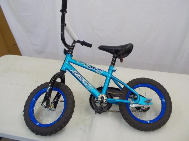 lot 23 image: NEXT Cobra 12-12 inch kids bike.&n...