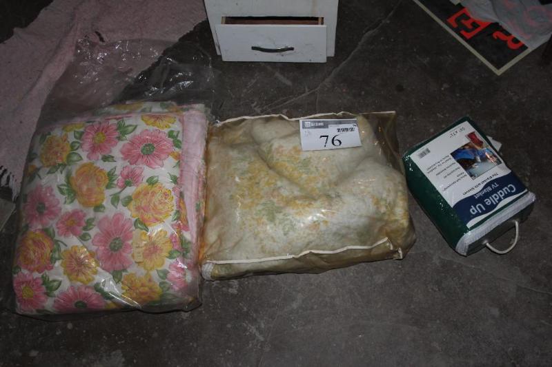 lot 76 image: Lot of (3) Blankets in Plastic Casi...