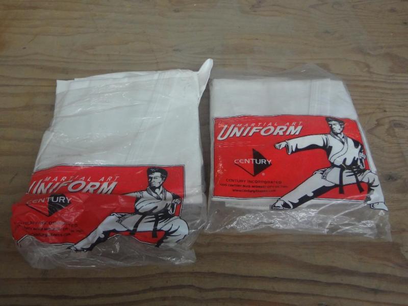 lot 119 image: (2) Unused Martial Arts Uniforms...