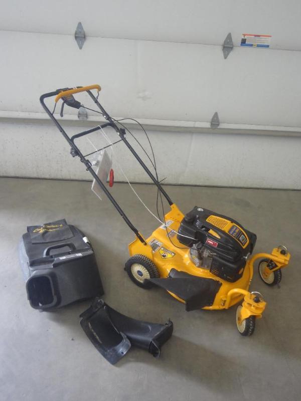 lot 28 image: Like New Cub Cadet 20" Lawn Mo...