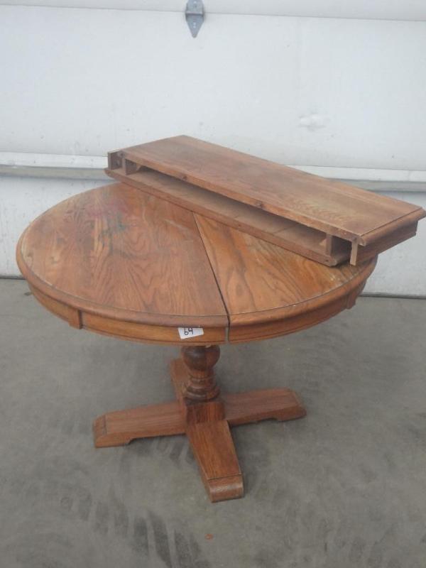 lot 64 image: Tiger Oak Round-Top Dining Table Wi...