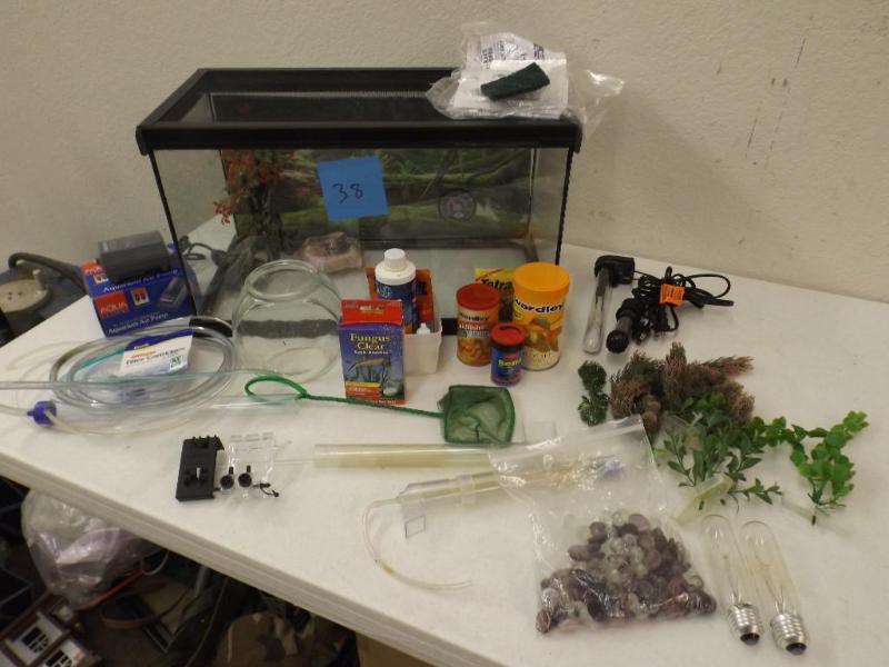 This lot includes a creature cage a...