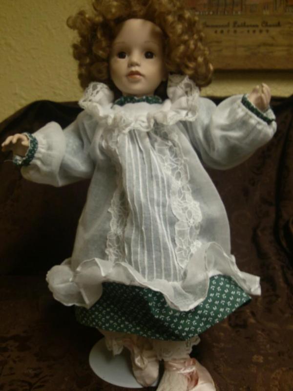 13&quot porcelain doll with stand...