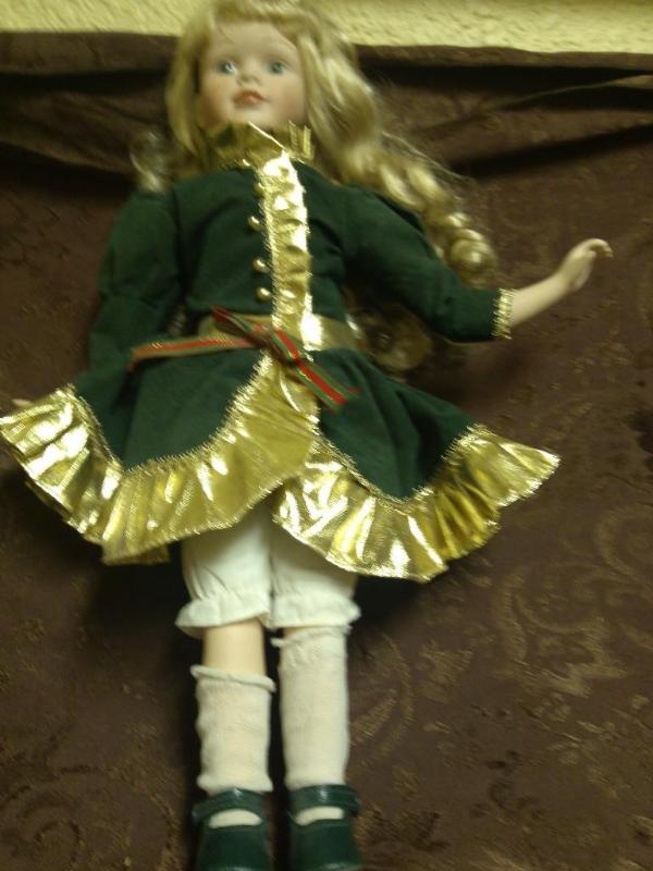 13&quot porcelain Christmas doll...