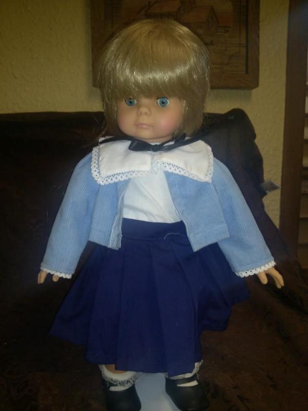 Collectable Porcelain Doll with blu...