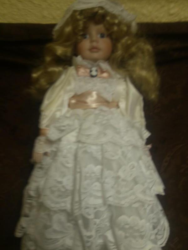 Beautiful porcelain doll with cameo...