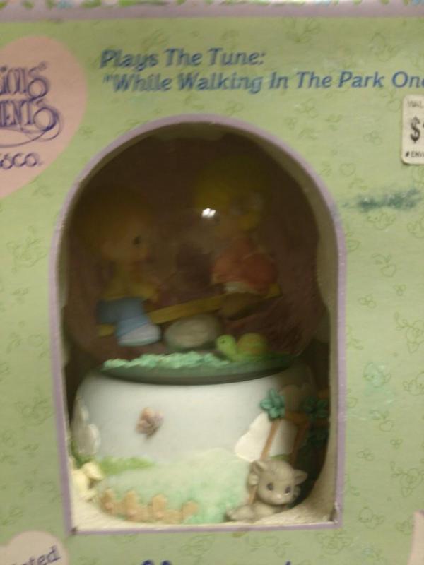 Precious Moments water globe teeter...
