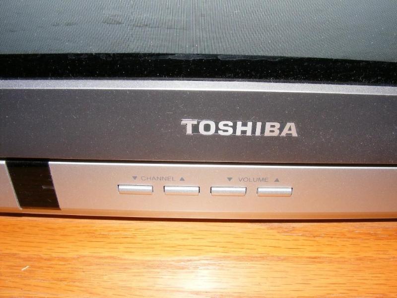 lot 118 image: Toshiba TV, with remote...