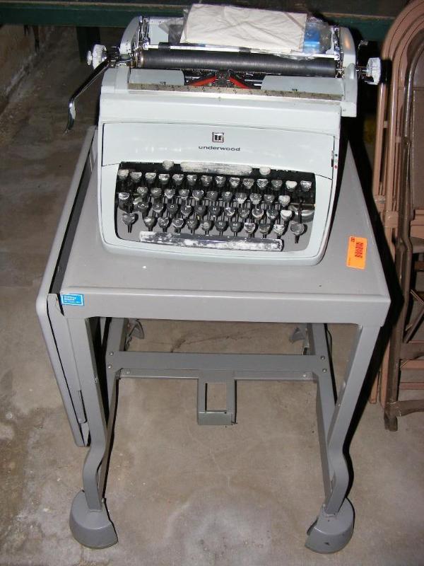lot 280 image: older Underwood Typewriter on cart...