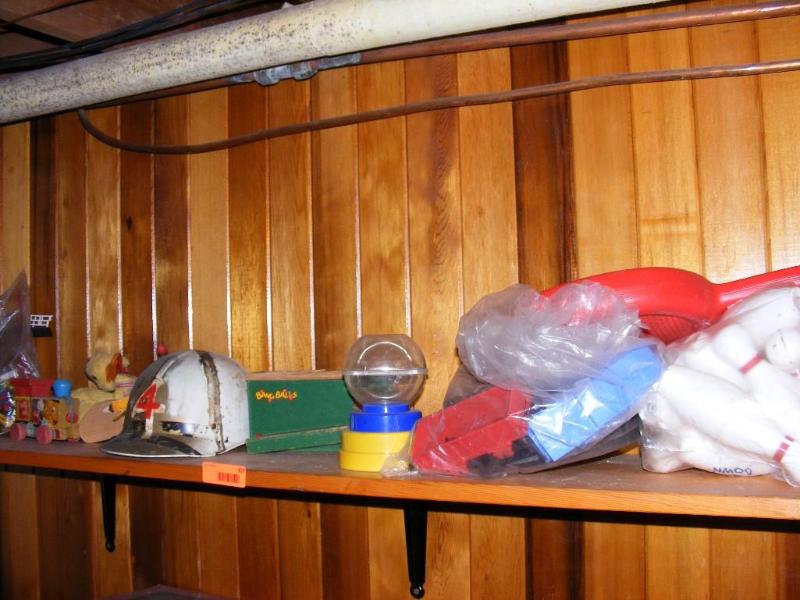 lot 307 image: All the toys on the top shelf, olde...