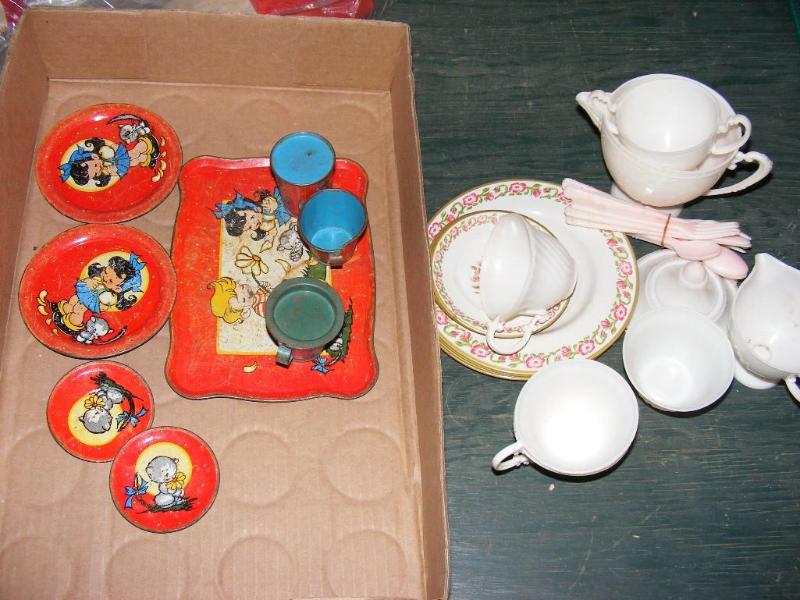 lot 340 image: older Childs Tea Sets, the red one...