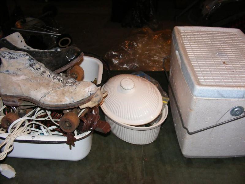 lot 372 image: styrofoam cooler, older roller skat...