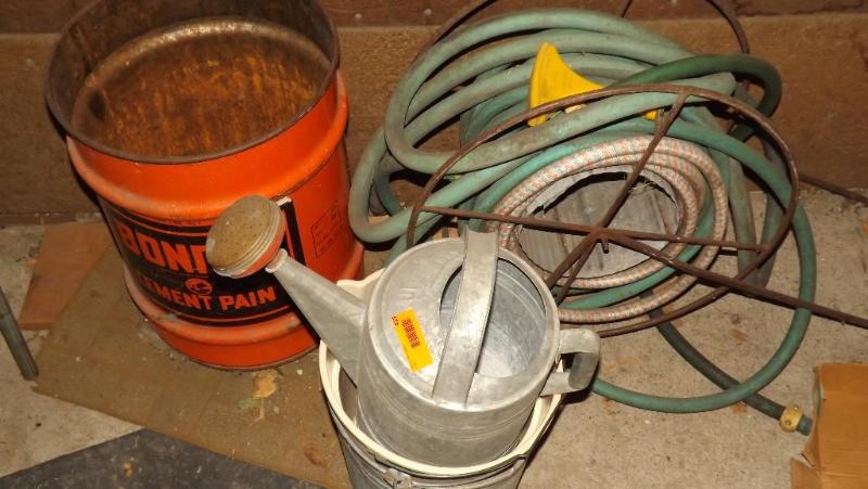 lot 419 image: Metal Can, Garden Hose on Metal win...