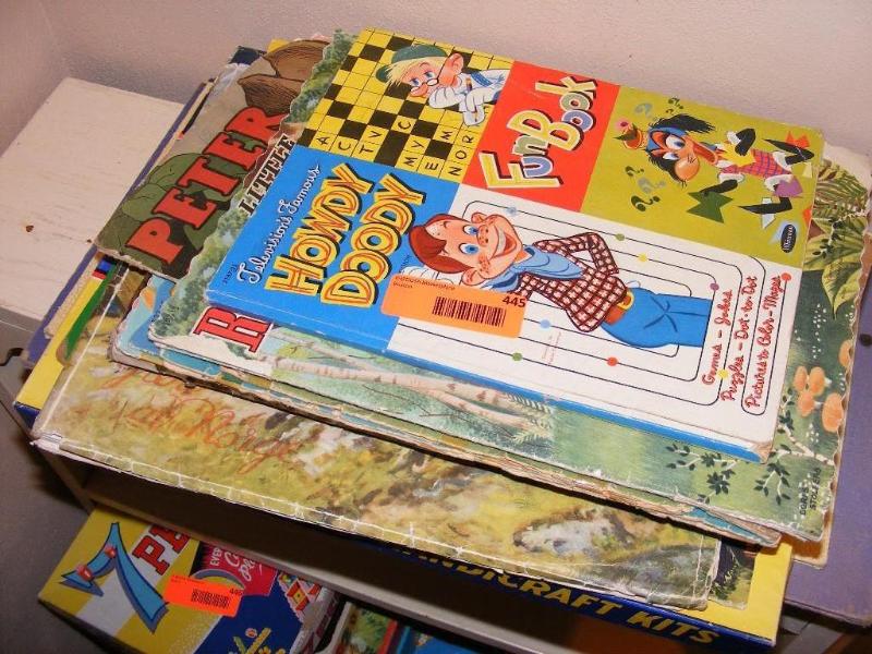 lot 445 image: Stack of Books and the Arrow Leathe...