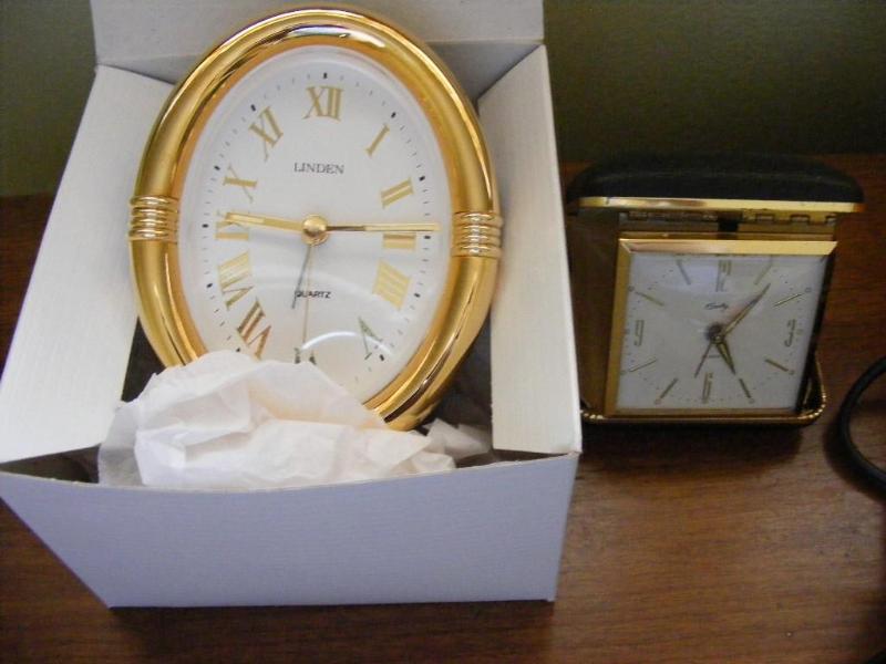 lot 83 image: Two Clocks, travel alarm clock and ...