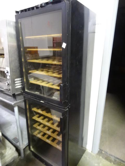 Refrigerated wine chiller. Holds 60...