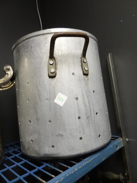 large aluminum pot with holes...