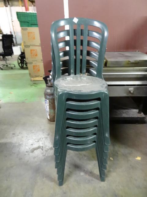 7 outdoor stackable patio chairs...
