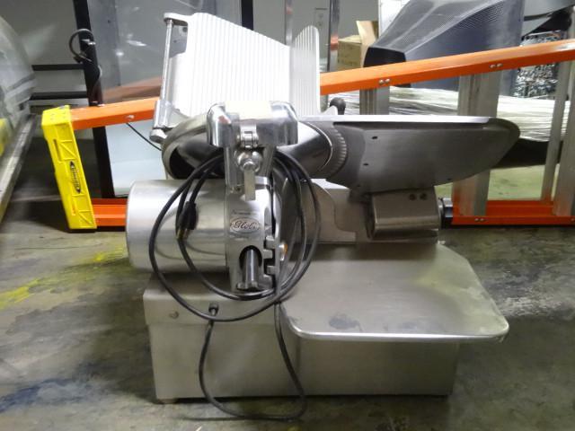 Globe meat slicer. 110 volt. Includ...