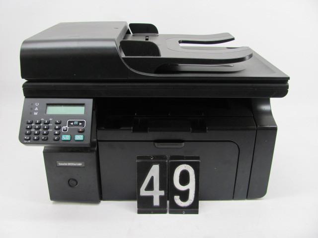 lot 49 image: HP M1212nf printer. This unit has p...