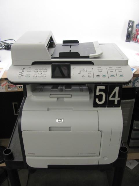 lot 54 image: HP color laserjet CM2320nf printer....