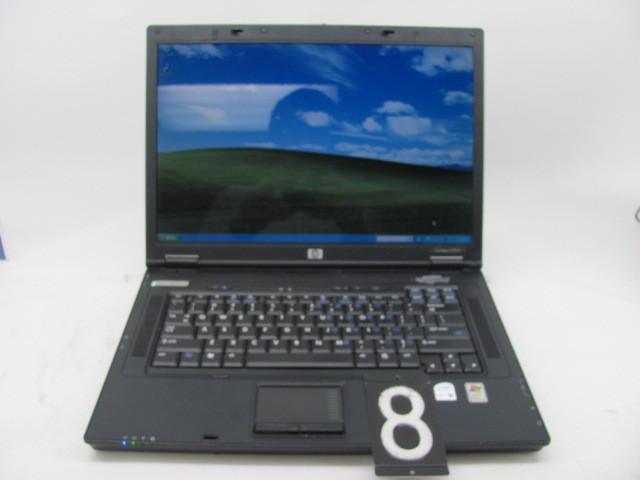 lot 8 image: HP compaq nx7300 laptop computer. T...