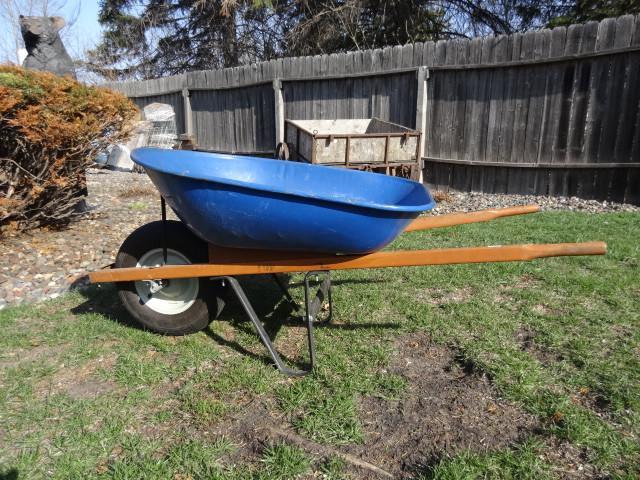 lot 11 image: Steel wheel barrow with balloon tir...