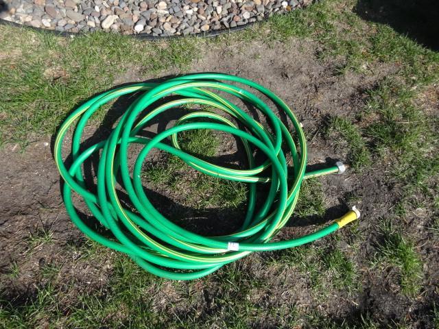 lot 12 image: 50 garden hose...