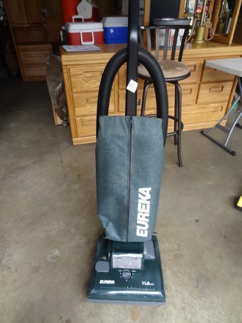 lot 121 image: Eureka 11 amp vacuum. Works...