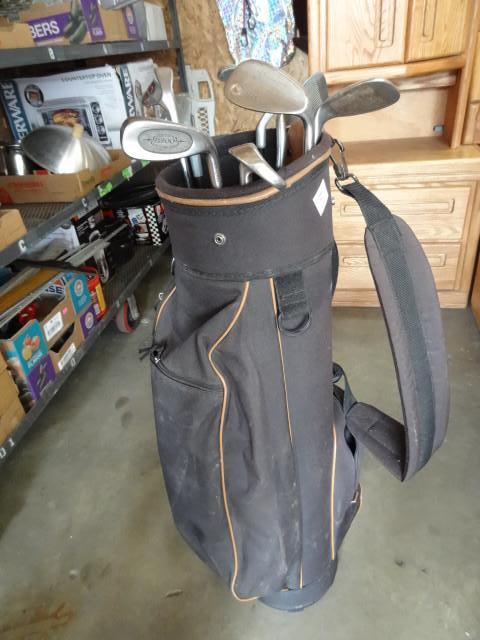 lot 127 image: Golf bag and 8 clubs. 2 chippers an...
