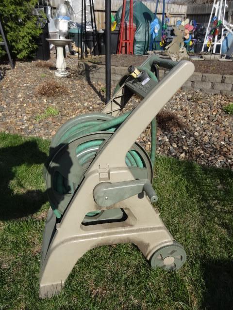 lot 15 image: Ames hose reel on wheels. 100...