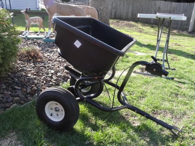 lot 3 image: Agri fab pull behind lawn spreader....